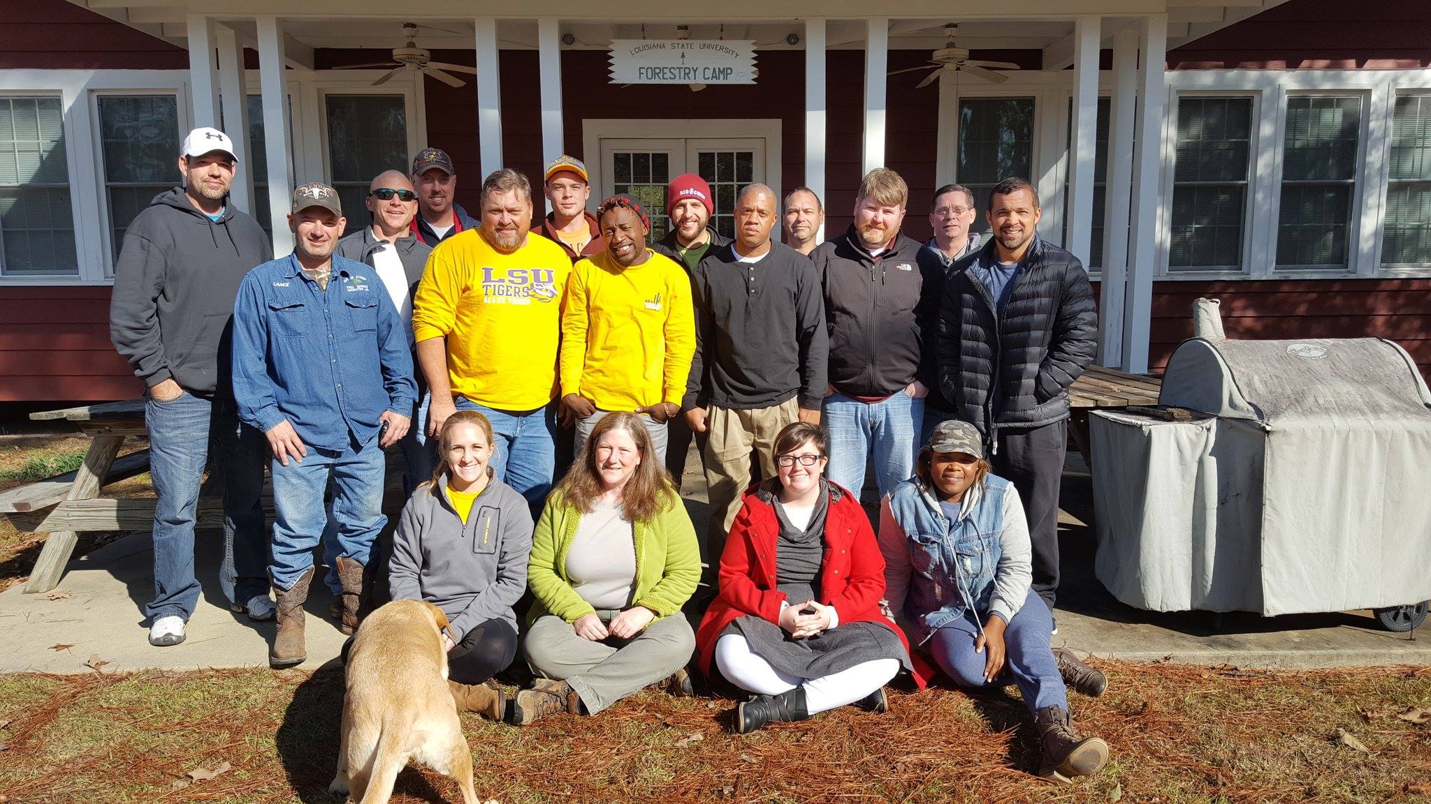 Review class members and exam candidates 2016 standing in front of the Lee Forest Camp Lodge.